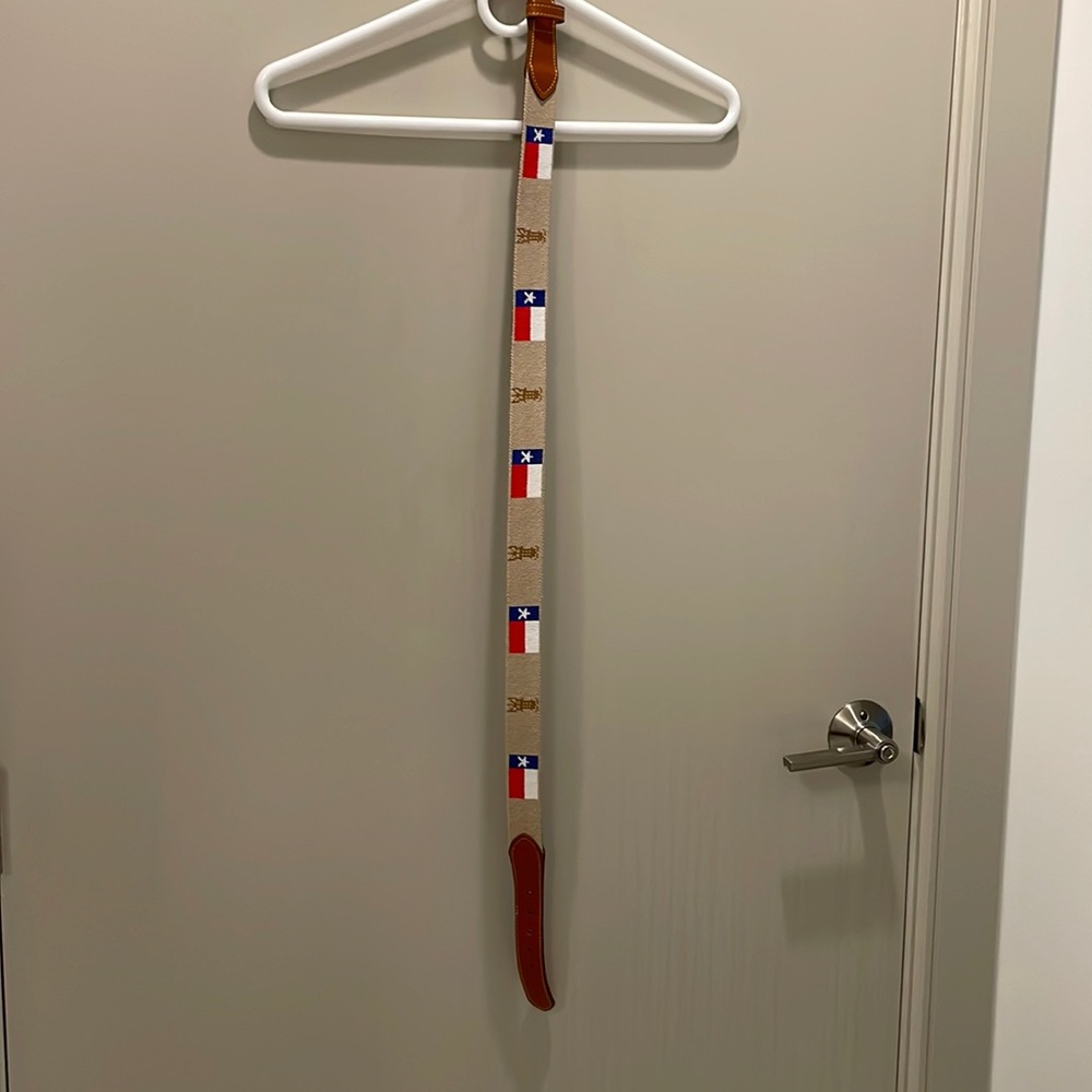 Brewster oil and Texas flag needlepoint belt size 32. Never been worn
